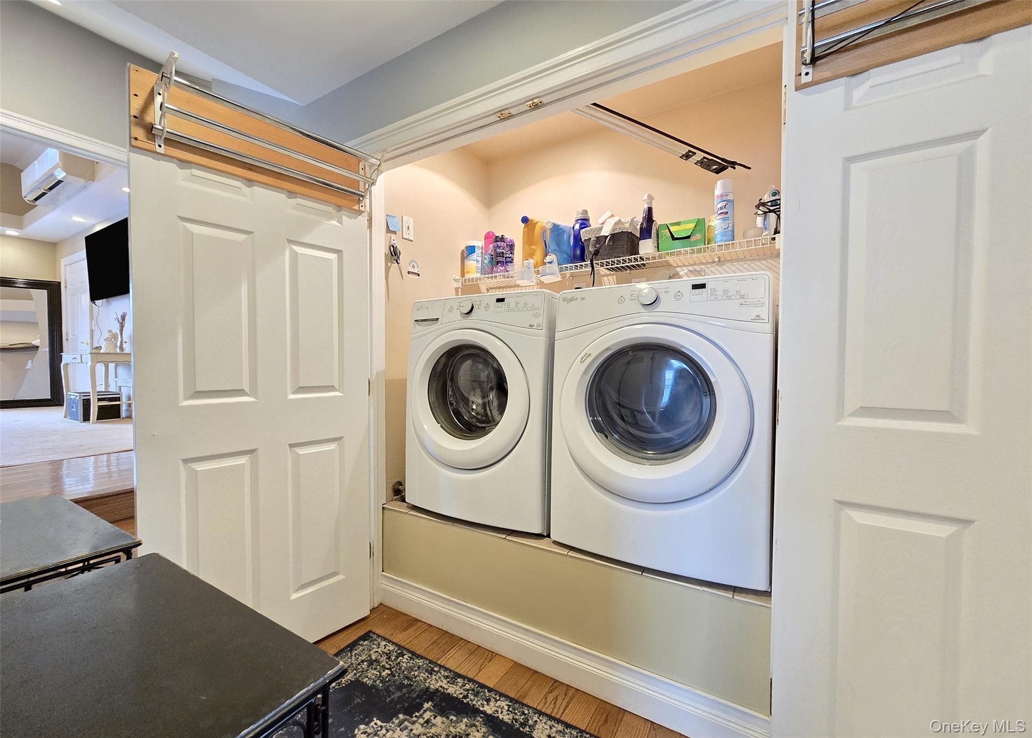 46 Harvest Lane Commack, NY 11725 - Photo 16 of 40 a utility room with dryer and washer