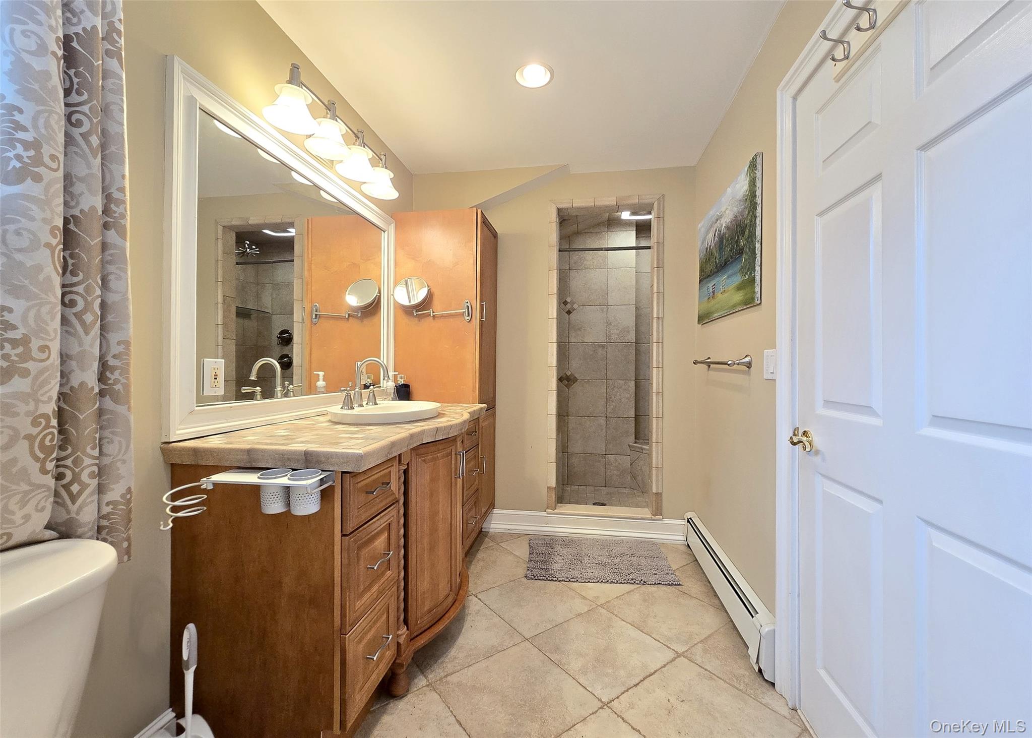 46 Harvest Lane Commack, NY 11725 - Photo 21 of 40 a bathroom with a granite countertop sink toilet and shower