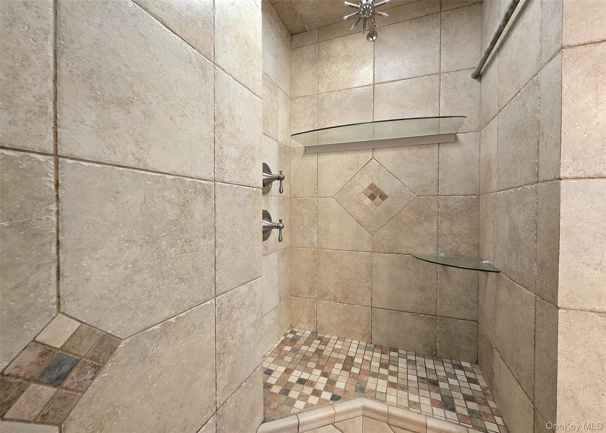 46 Harvest Lane Commack, NY 11725 - Photo 22 of 40 a bathroom with a shower