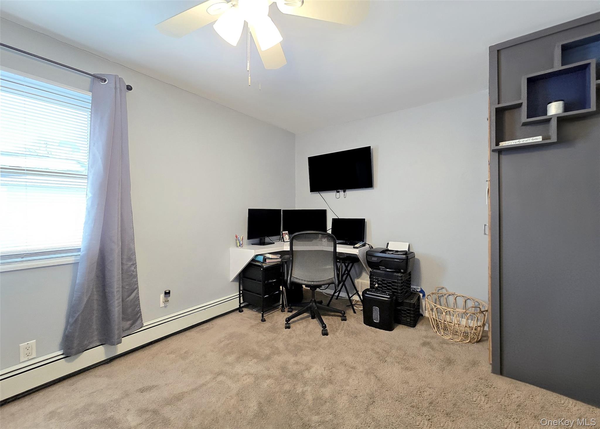 46 Harvest Lane Commack, NY 11725 - Photo 26 of 40 a view of a workspace with a window