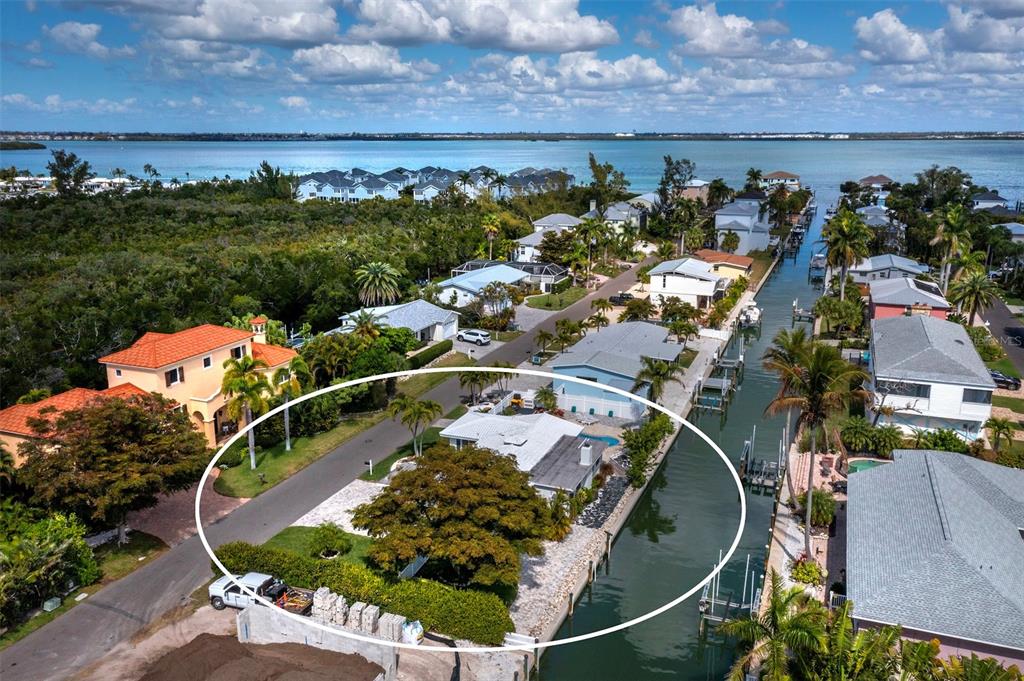 726 Jungle Queen Way Longboat Key, FL 34228 - Photo 3 of 43 an aerial view of a house with a ocean view