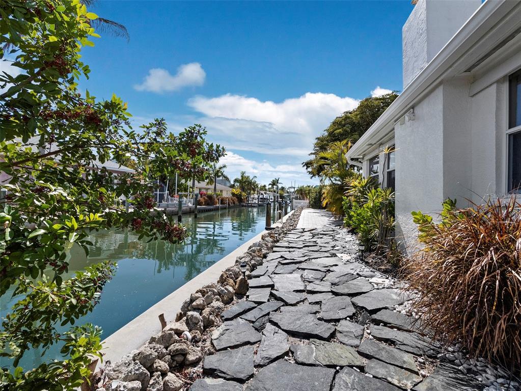 726 Jungle Queen Way Longboat Key, FL 34228 - Photo 33 of 43 a view of lake