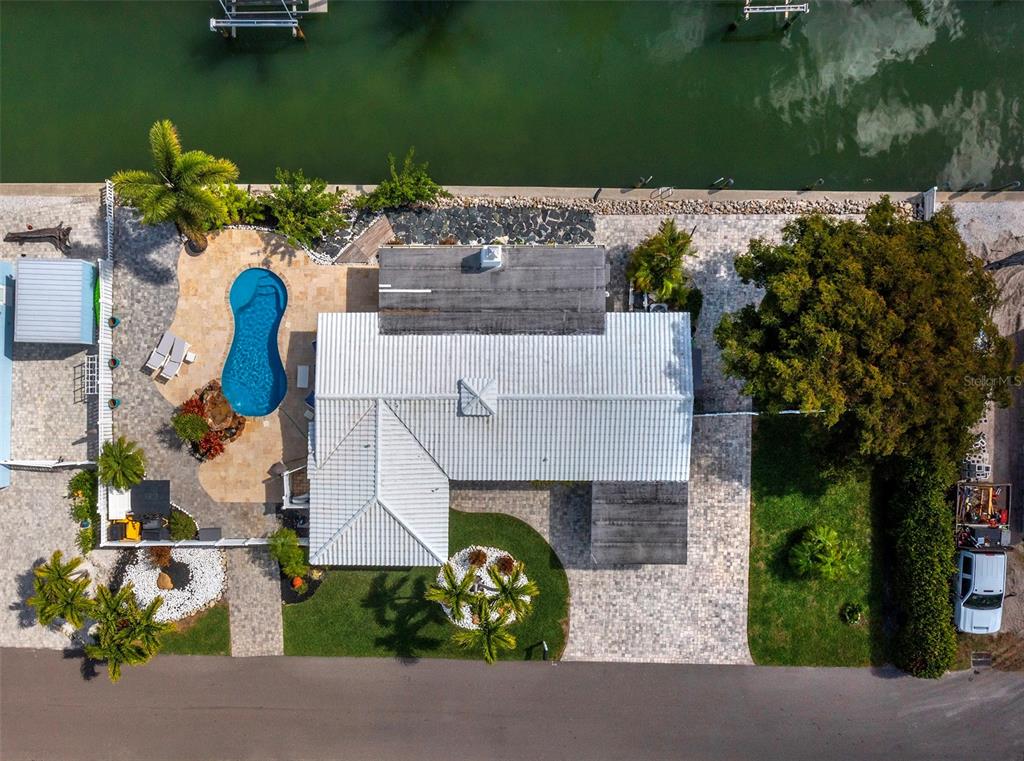 726 Jungle Queen Way Longboat Key, FL 34228 - Photo 42 of 43 an aerial view of a house with yard swimming pool and outdoor seating