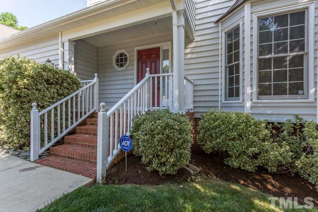 8620 Erinsbrook Drive Raleigh, NC 27617 - Photo 2 of 25 a view of a house with a yard