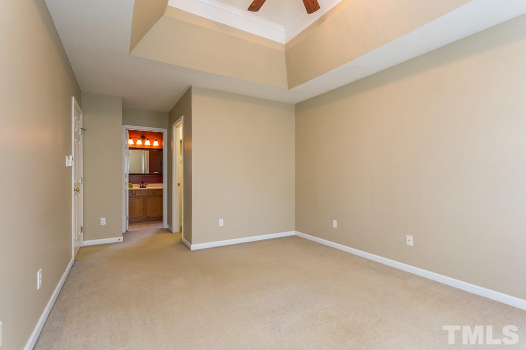 8620 Erinsbrook Drive Raleigh, NC 27617 - Photo 15 of 25 a view of an empty room and window