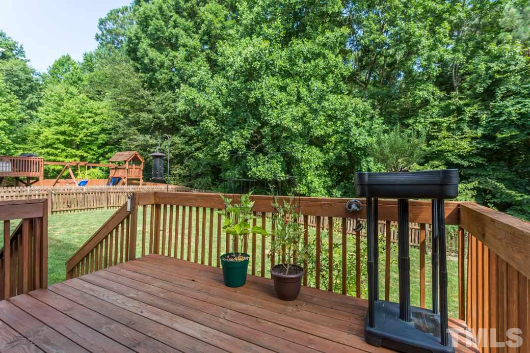 8620 Erinsbrook Drive Raleigh, NC 27617 - Photo 18 of 25 a view of deck with patio