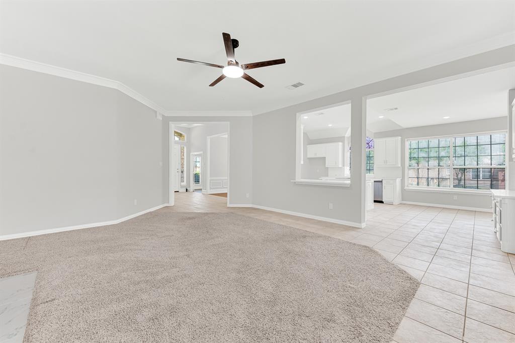 3500 Neiman Road Plano, TX 75025 - Photo 12 of 26 The hub of the home, the family room has access from the foyer and directly to the breakfast nook and kitchen.