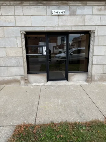 a kitchen with granite countertop a stove and a cabinets