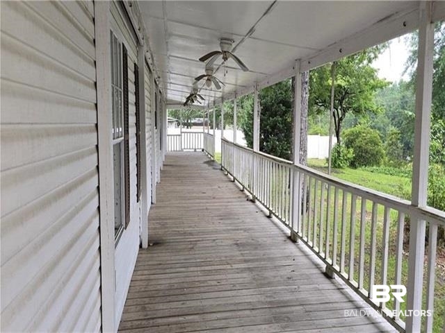 15296 Celeste Road Chunchula, AL 36521 - Photo 7 of 8 Deck with ceiling fan