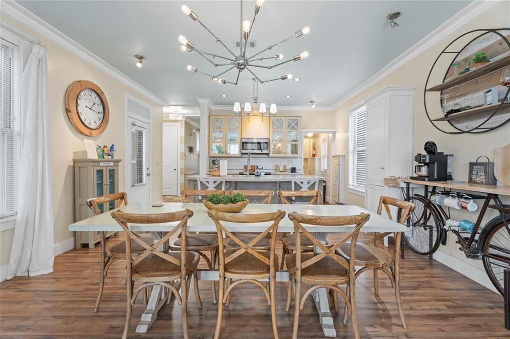 243 Bluegill Road Eatonton, GA 31024 - Photo 17 of 54 a view of a dining room with furniture and a large window