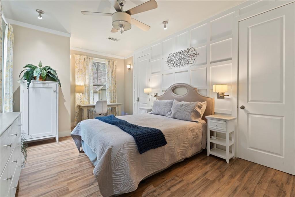 243 Bluegill Road Eatonton, GA 31024 - Photo 21 of 54 a bedroom with a bed and a window
