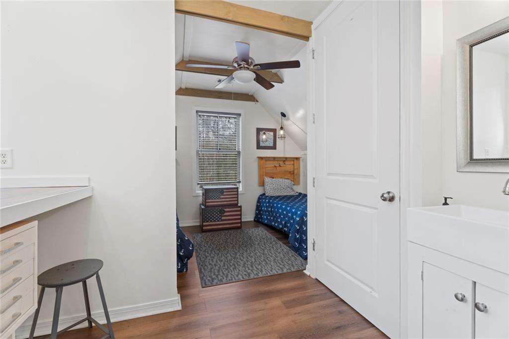 243 Bluegill Road Eatonton, GA 31024 - Photo 29 of 54 a view of hallway with furniture and wooden floor