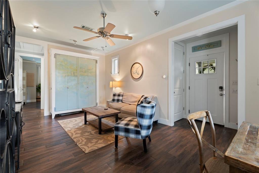 243 Bluegill Road Eatonton, GA 31024 - Photo 39 of 54 a living room with furniture and wooden floor