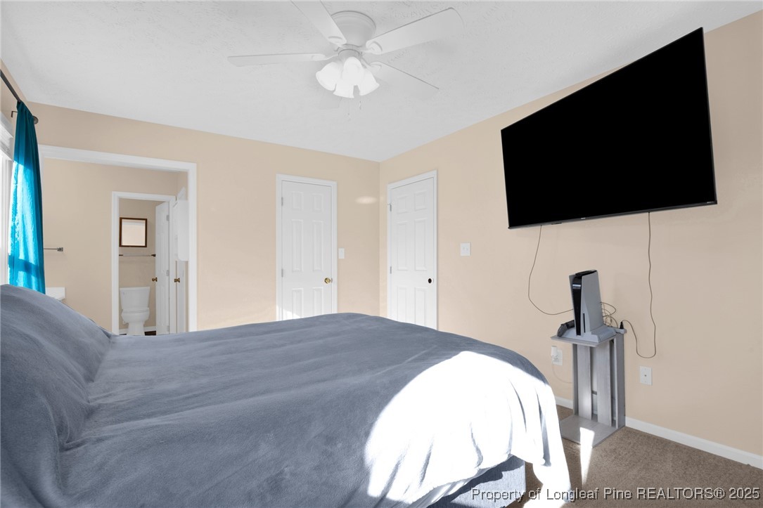 101 2 Hours Court Raeford, NC 28376 - Photo 21 of 30 a view of a livingroom with a flat screen tv