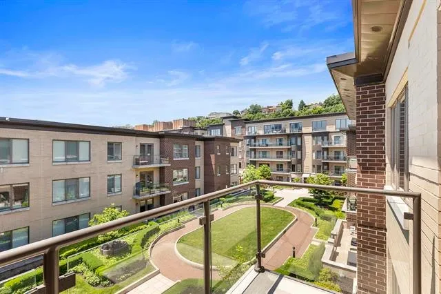 a view of a balcony with a swimming pool