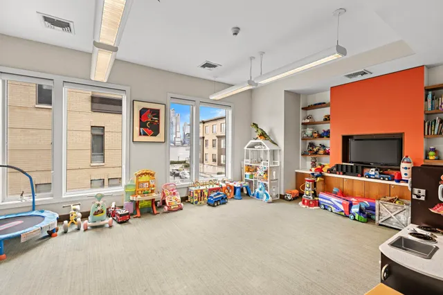 a very nice looking room with wooden floor