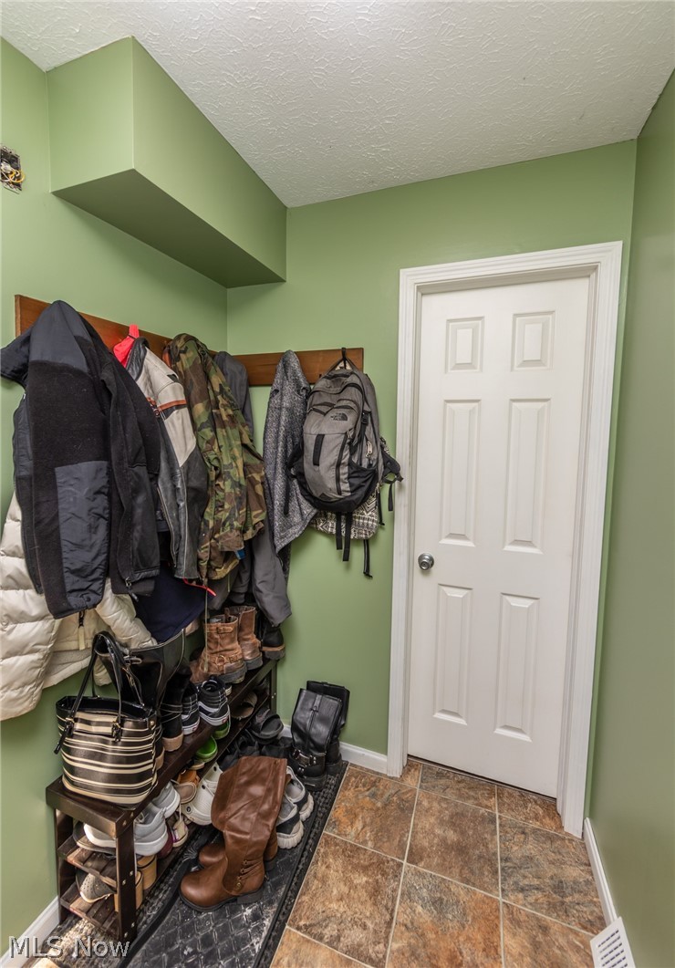 1228 Cleveland Road West Huron, OH 44839 - Photo 17 of 35 Mud Room off garage, half bath behind door