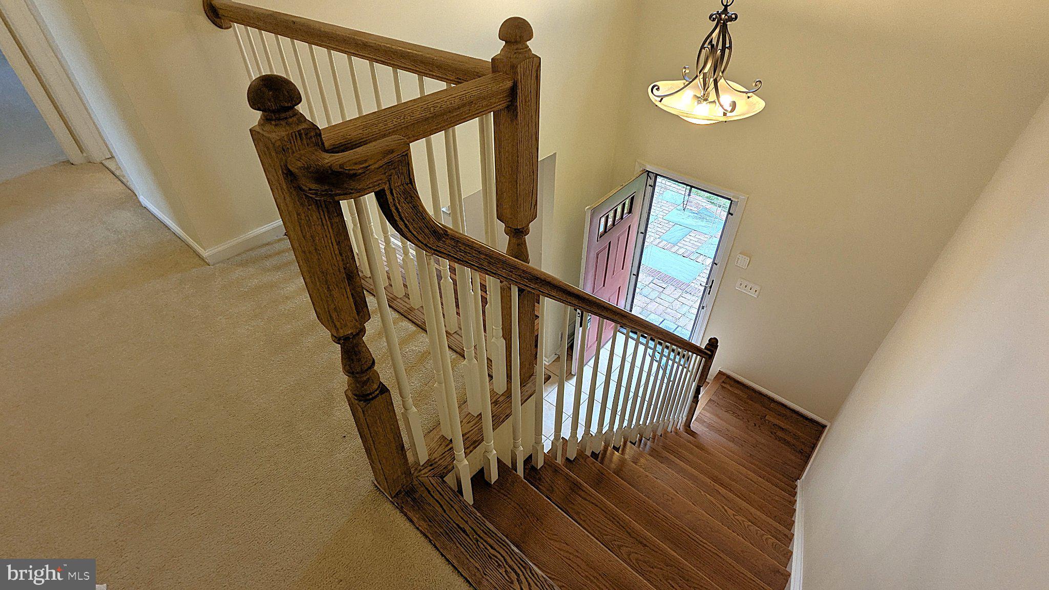 1835 Batten Hollow Road Vienna, VA 22182 - Photo 36 of 50 Inviting staircase with natural light.