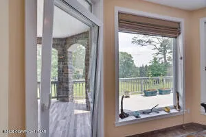 a view of a living room and entryway