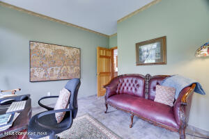 17 Cricket Hill Road Hawley, PA 18428 - Photo 27 of 93 a living room with furniture and a painting