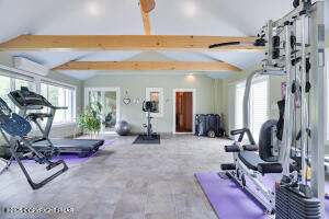 17 Cricket Hill Road Hawley, PA 18428 - Photo 32 of 93 Gym leading to Spa