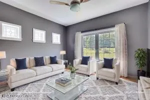 a view of a lake with houses in the back