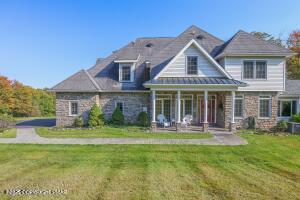 17 Cricket Hill Road Hawley, PA 18428 - Photo 76 of 93 a front view of a house with a yard