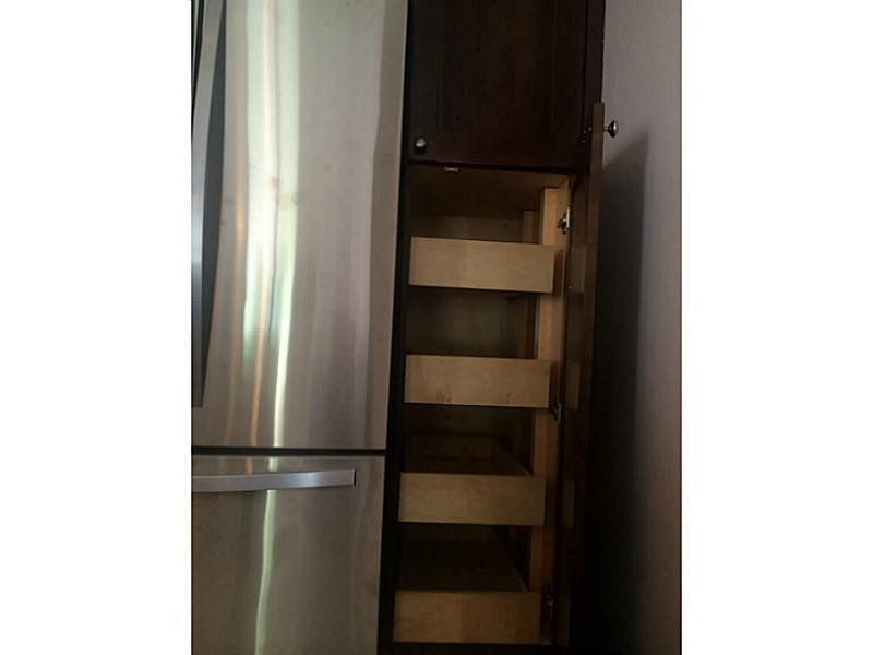 21080 Woodspring Avenue Boca Raton, FL 33428 - Photo 6 of 20 a view of walk in closet with empty racks