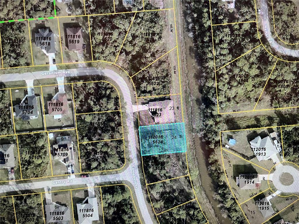 24 Campbell Street North Port, FL 34288 - Photo 1 of 3 an aerial view of a house with street