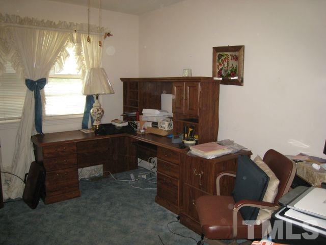 3712 Allen Street West Raleigh, NC 27603 - Photo 16 of 23 a room with furniture and window