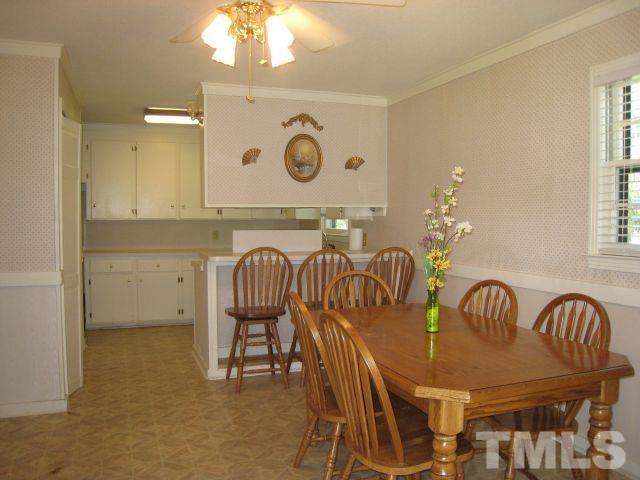 3712 Allen Street West Raleigh, NC 27603 - Photo 5 of 23 a dining room with furniture and window