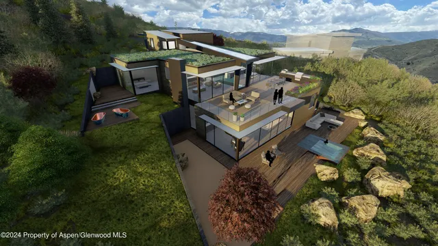 a view of a house with a big yard and large trees