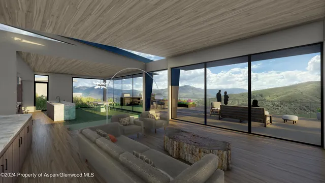 a living room with furniture and a floor to ceiling window