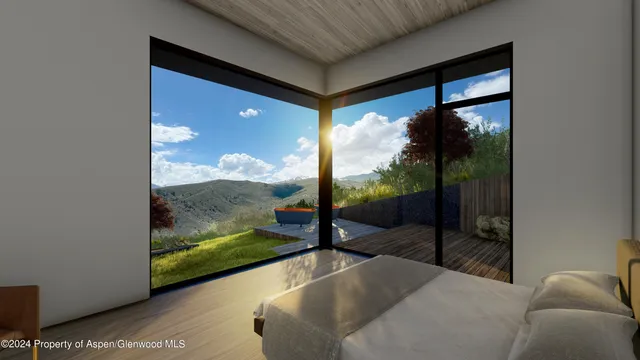 a view of a floor to ceiling window and a balcony