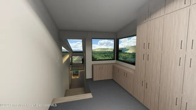 a kitchen with a refrigerator and window