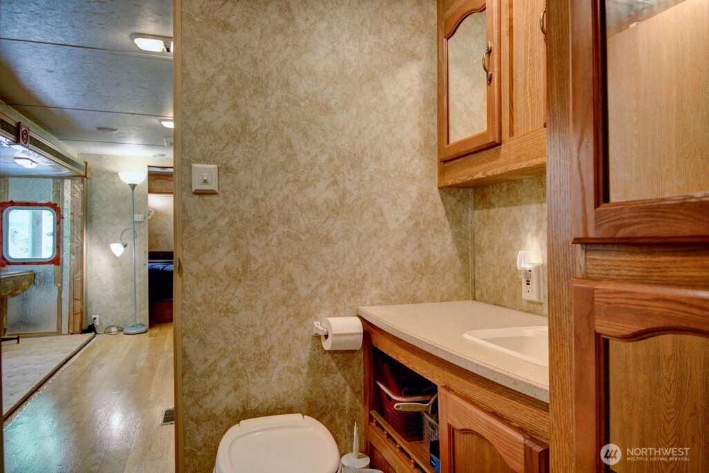 38 Gold Nuget Road Deming, WA 98244 - Photo 12 of 36 a bathroom with a sink a toilet and shower