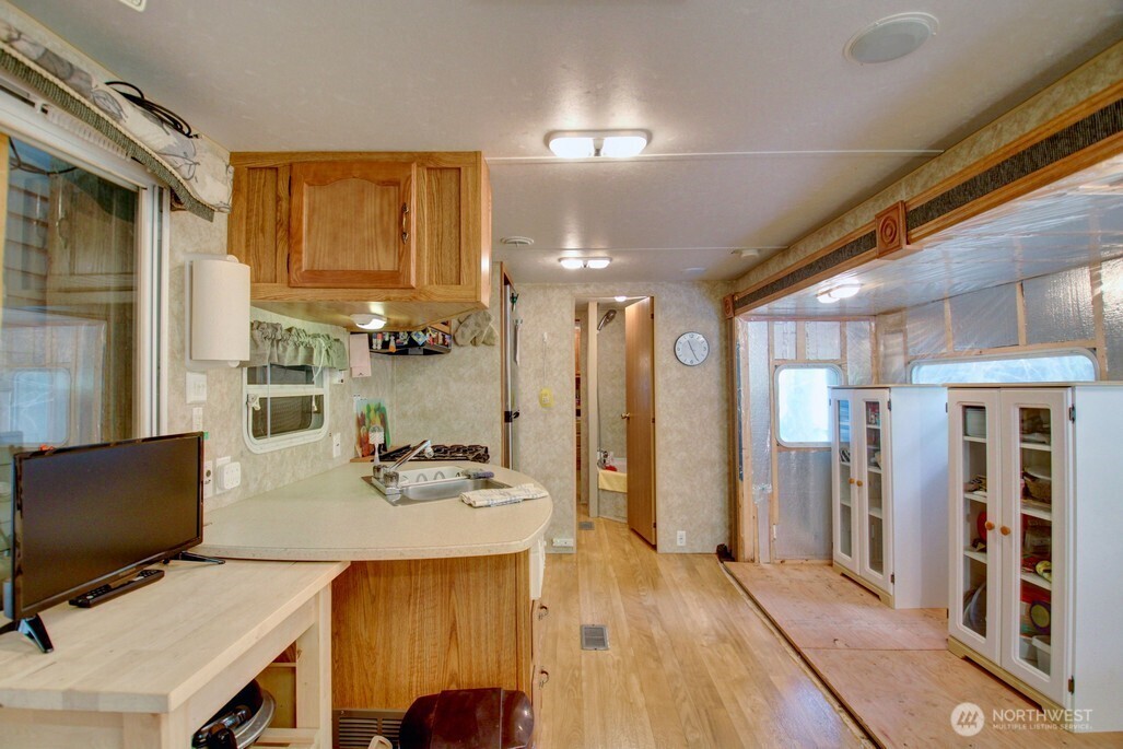 38 Gold Nuget Road Deming, WA 98244 - Photo 14 of 36 a view of a workspace with furniture and wooden floor