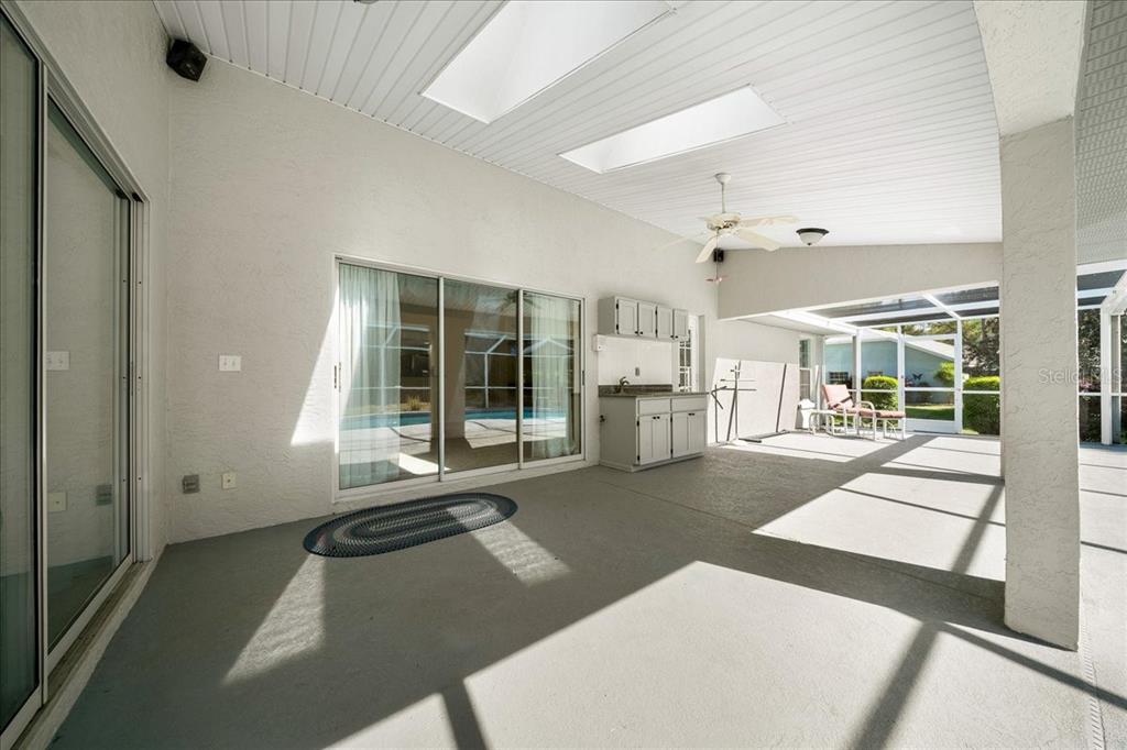 9660 Southwest 196th Avenue Road Dunnellon, FL 34432 - Photo 28 of 67 a living room with furniture and a large window
