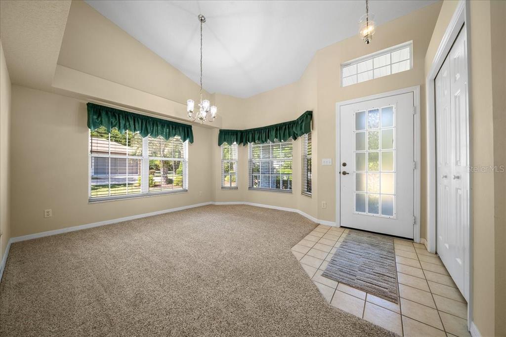 9660 Southwest 196th Avenue Road Dunnellon, FL 34432 - Photo 31 of 67 a view of an empty room with a fireplace and a window