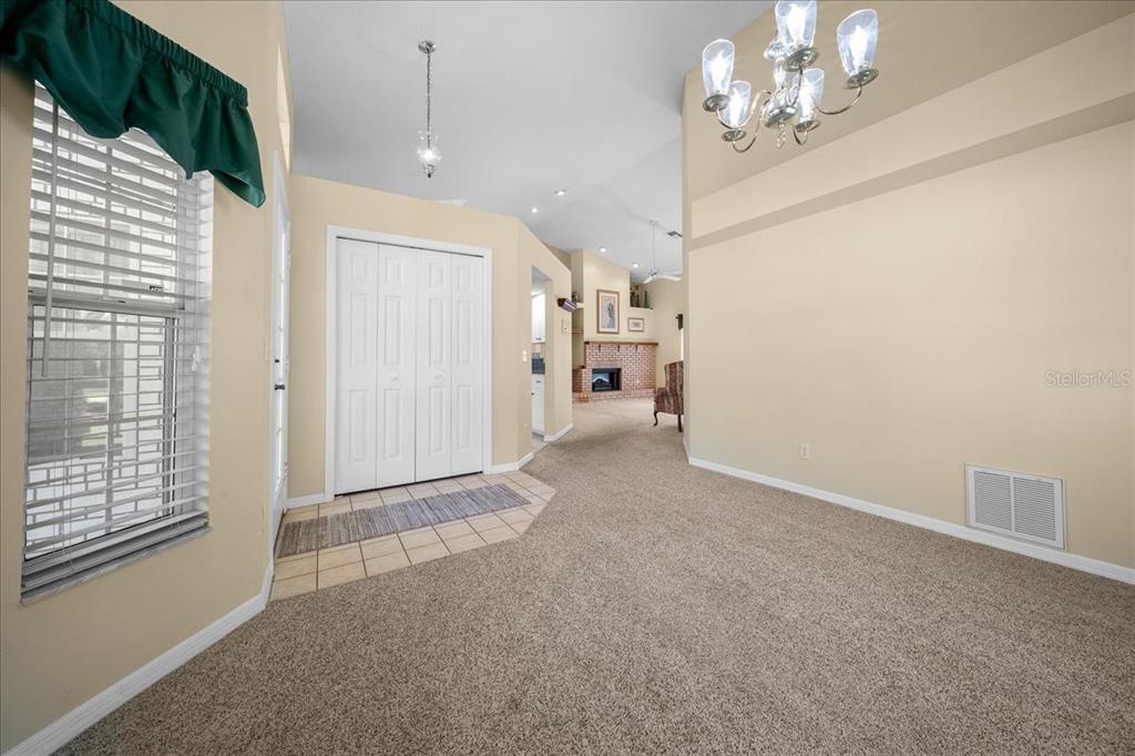 9660 Southwest 196th Avenue Road Dunnellon, FL 34432 - Photo 32 of 67 a view of a livingroom with a chandelier