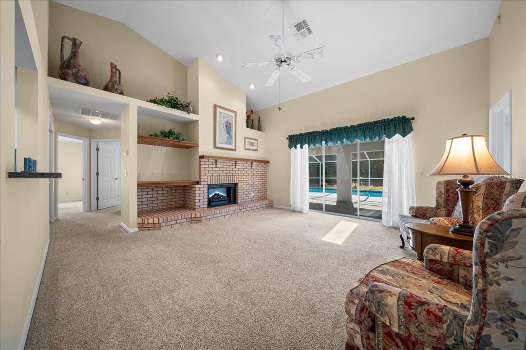 9660 Southwest 196th Avenue Road Dunnellon, FL 34432 - Photo 34 of 67 a view of a livingroom with furniture and a fireplace