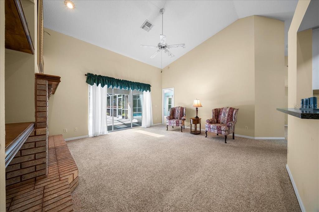 9660 Southwest 196th Avenue Road Dunnellon, FL 34432 - Photo 37 of 67 a view of a livingroom with furniture and window