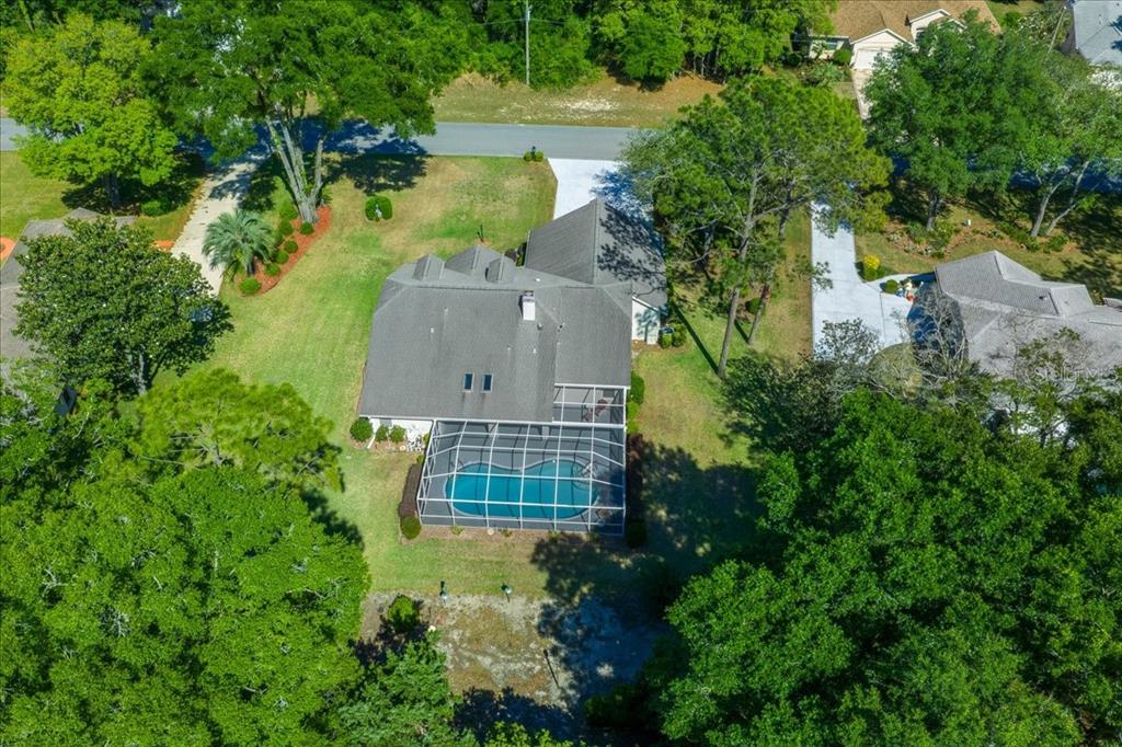 9660 Southwest 196th Avenue Road Dunnellon, FL 34432 - Photo 5 of 67 an aerial view of residential house with outdoor space and trees around