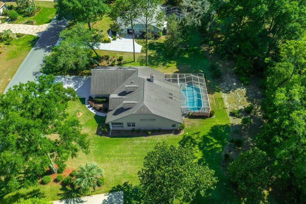 9660 Southwest 196th Avenue Road Dunnellon, FL 34432 - Photo 6 of 67 an aerial view of a house with garden space and street view