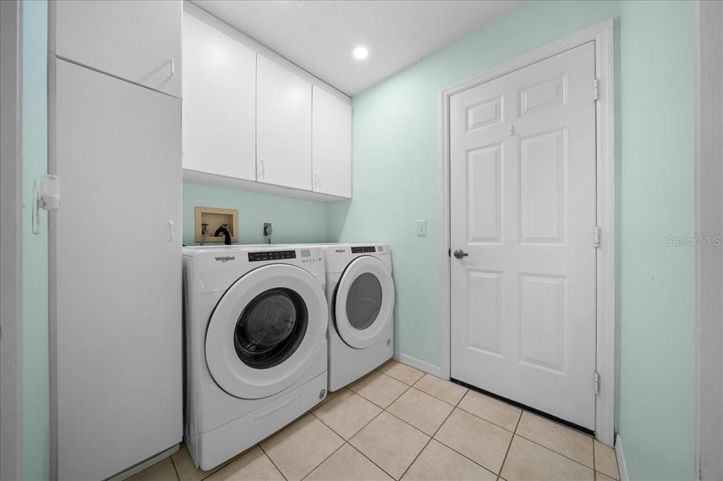 9660 Southwest 196th Avenue Road Dunnellon, FL 34432 - Photo 64 of 67 a utility room with dryer and washer
