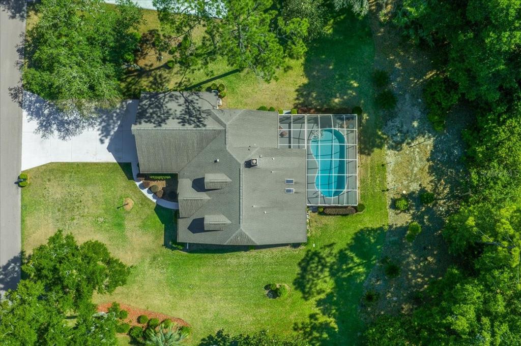 9660 Southwest 196th Avenue Road Dunnellon, FL 34432 - Photo 7 of 67 an aerial view of a house with a yard