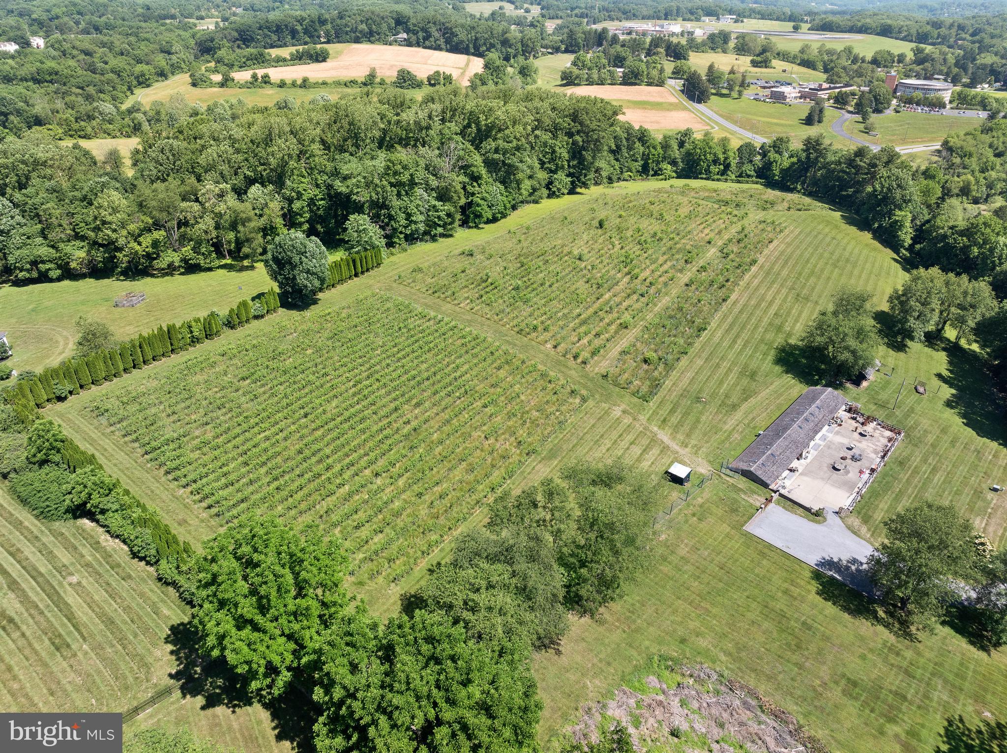 1740 Lenape Road West Chester, PA 19382 - Photo 110 of 120 an aerial view of a house with a yard