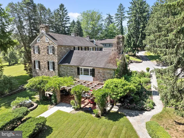 a view of house with yard outdoor seating and entertaining space