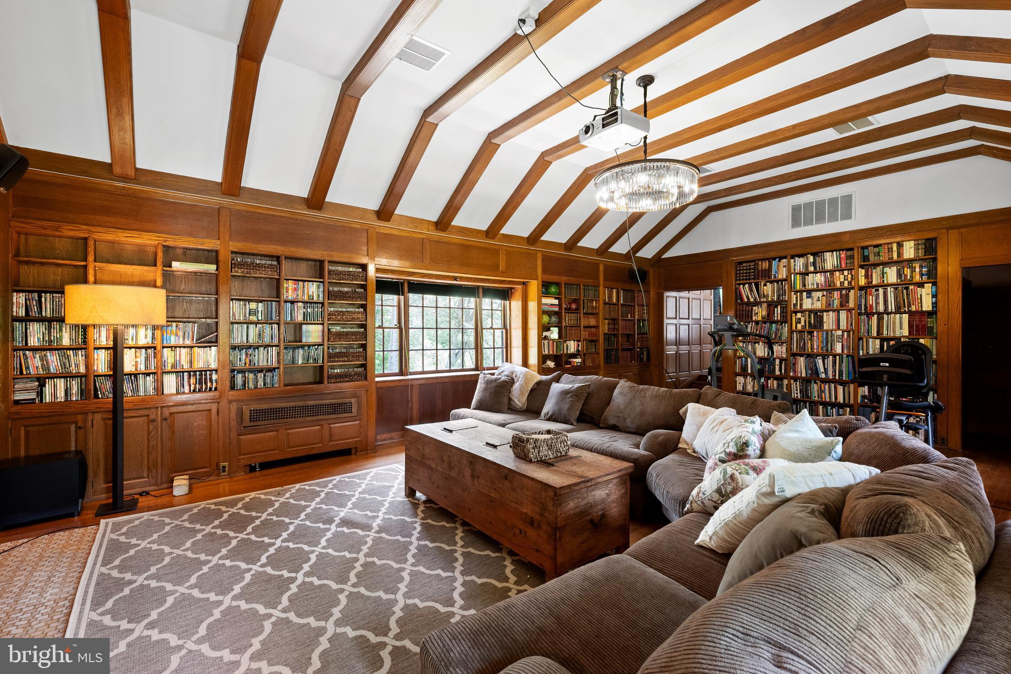 1740 Lenape Road West Chester, PA 19382 - Photo 33 of 120 a living room with furniture and a floor to ceiling window
