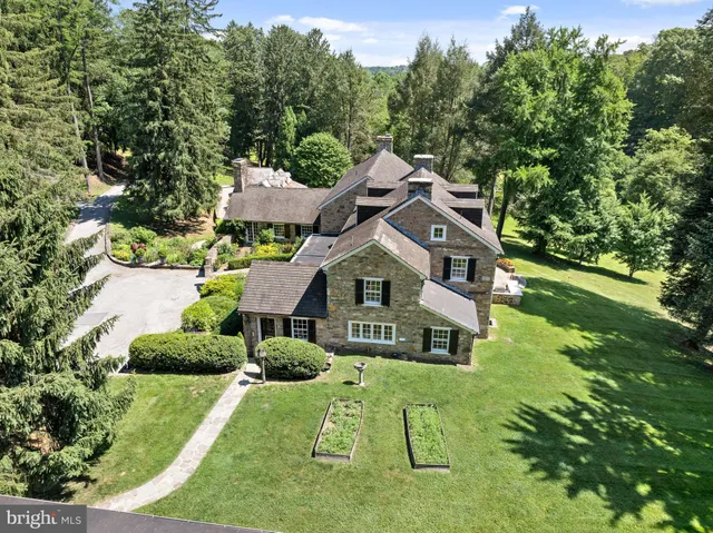 a view of house with yard and entertaining space